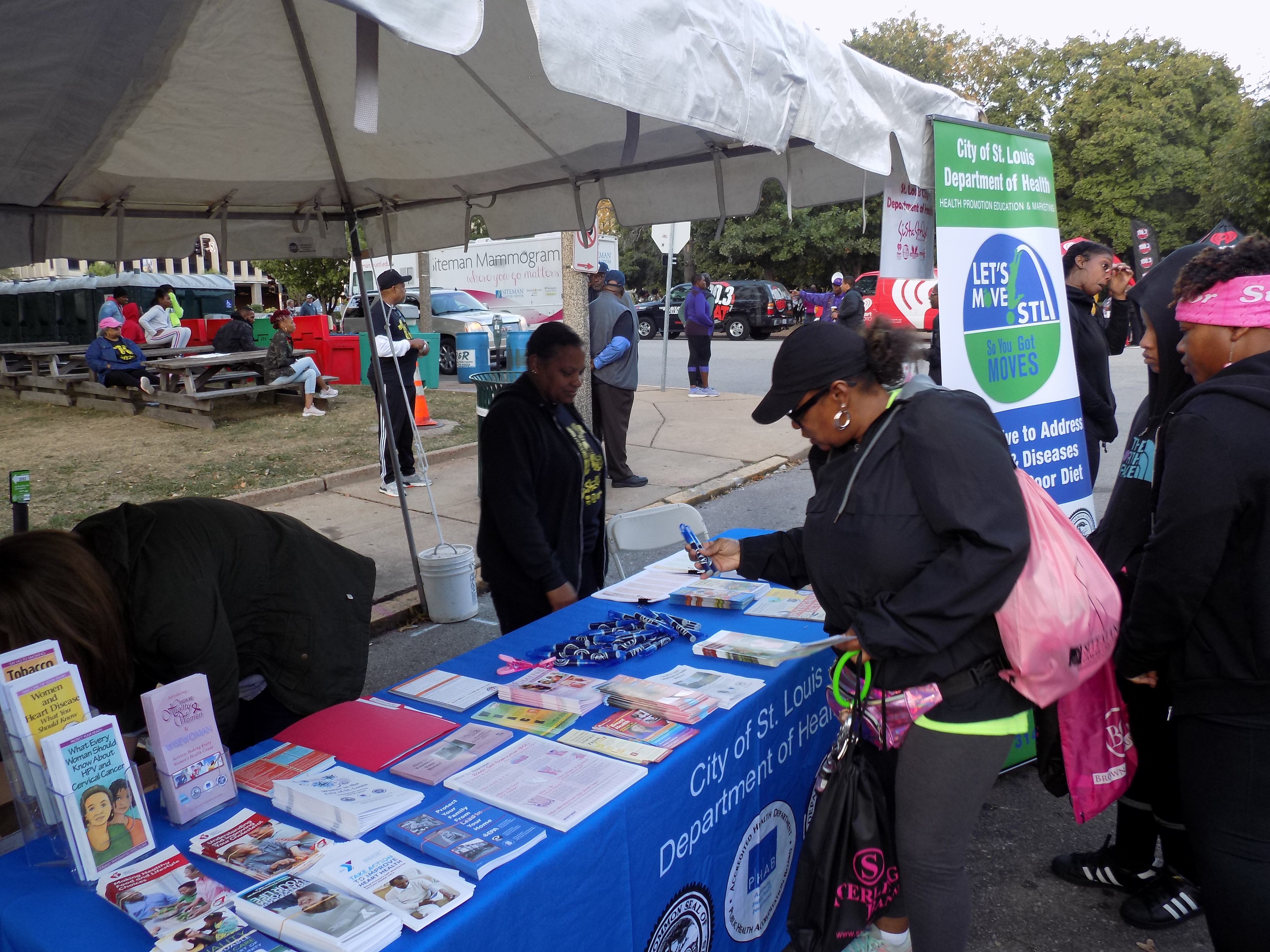 Sista Strut attendees visit the Department of Health (DOH) table