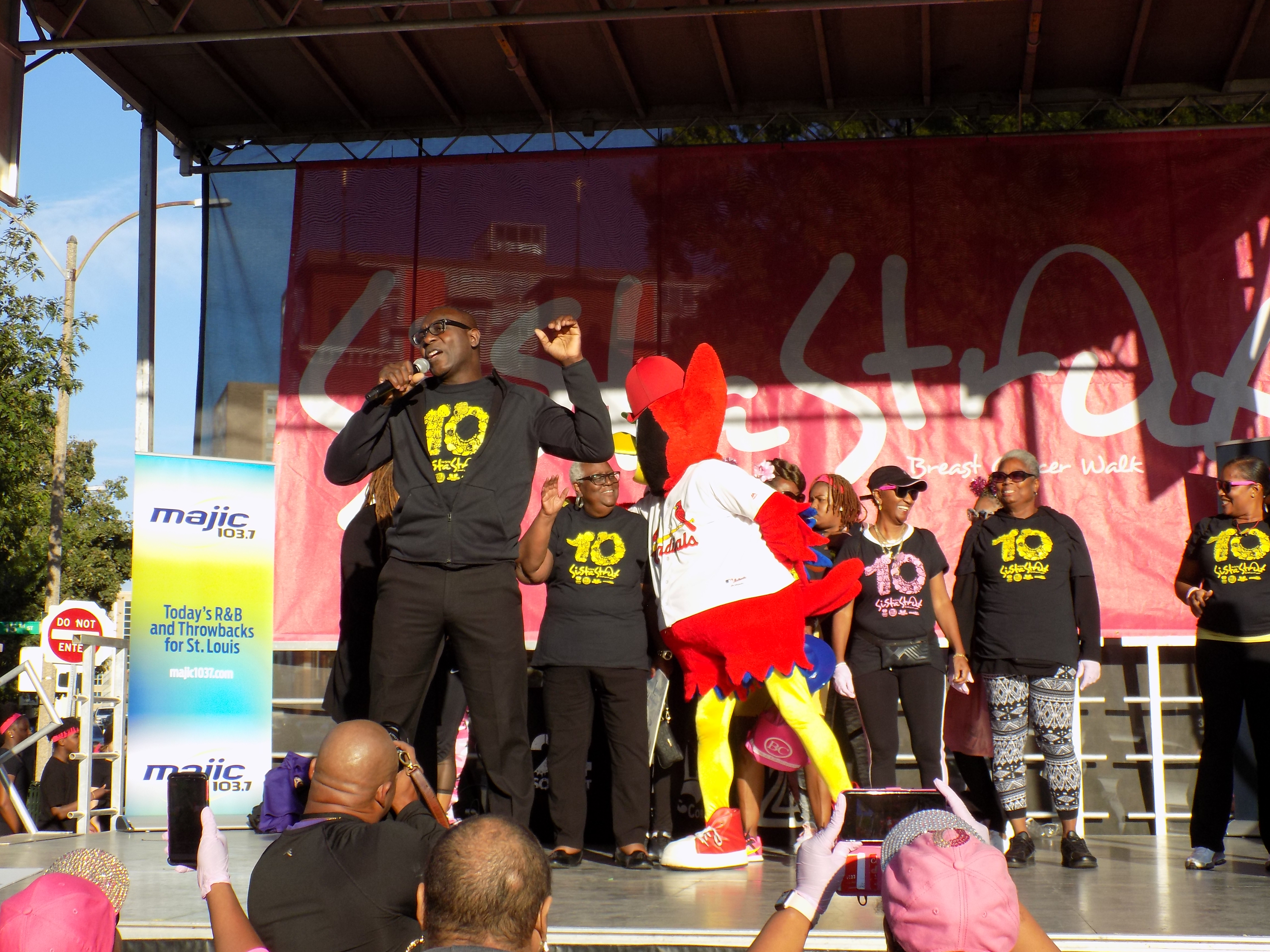 Board of Aldermen President Reed and Fredbird talk to the crowd