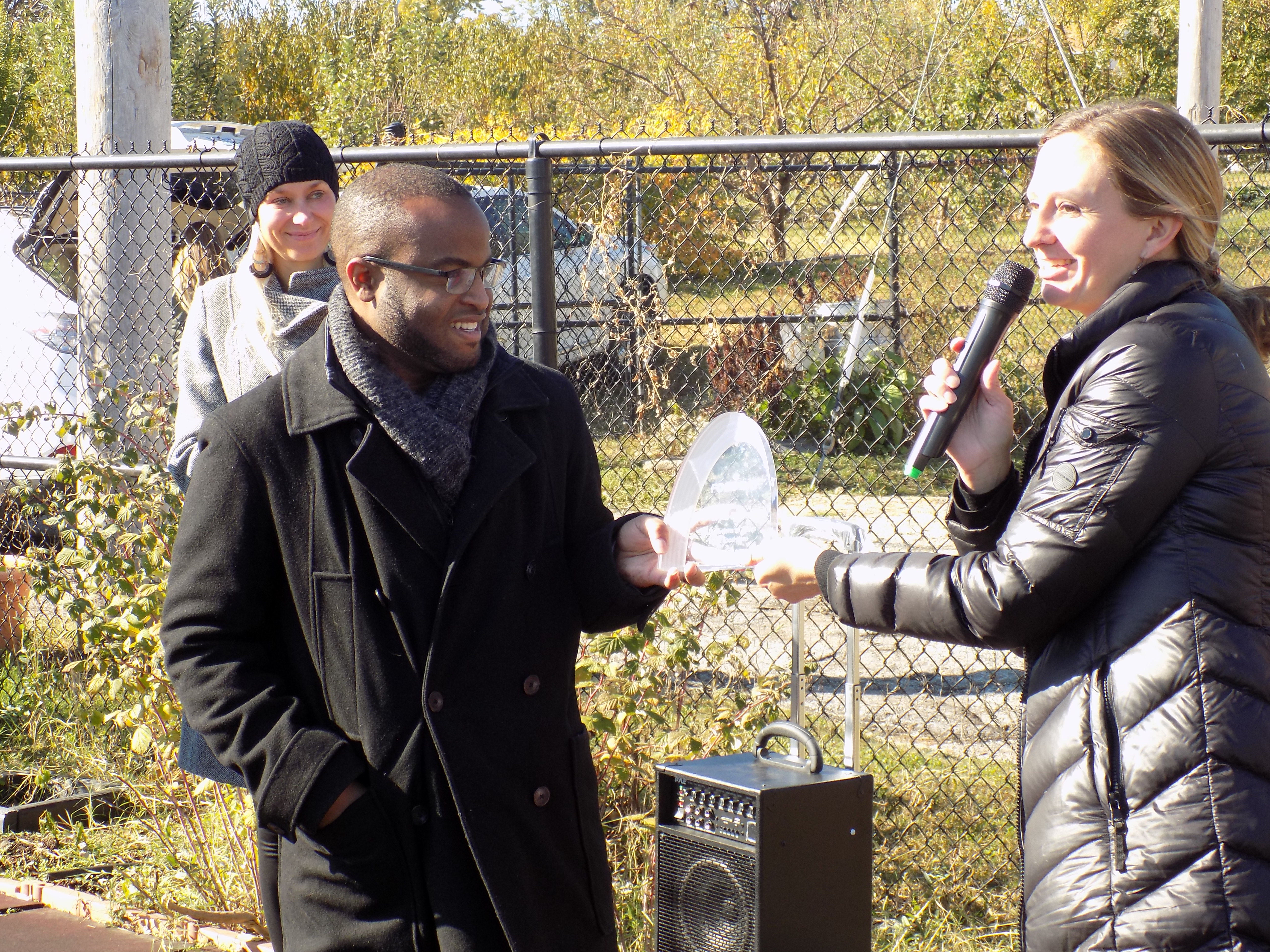 SLU and DOH Dietitian Lauren Landfried recognizes Bryan Rogers from Gateway Greening as this year's keynote speaker.