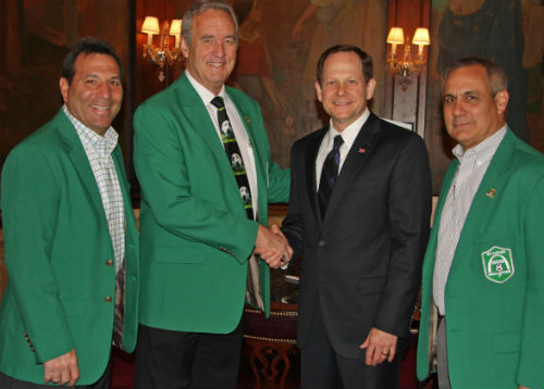 Mayor Francis Slay is surprised by members of the St. Louis Soccer Hall of Fame Committee April 10, 2014.