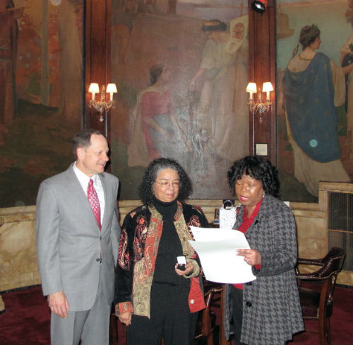 Mayor Slay, Candice Gordon and Ivy Neyland-Pinkston reading proclamation 