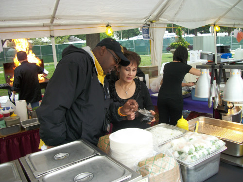 Kevin Huntspon confers with vendor